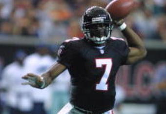 11 Nov 2001:  Quarterback Michael Vick #7 of the Atlanta Falcons throws a pass against the Dallas Cowboys in the Georgia Dome in Atlanta, Georgia.  The Falcons defeated the Cowboys 20-13. DIGITAL IMAGE.  Mandatory Credit: Scott Halleran/ALLSPORT