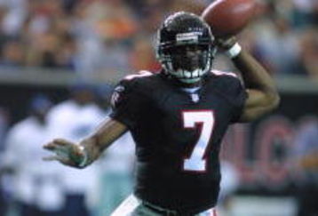 11 Nov 2001:  Quarterback Michael Vick #7 of the Atlanta Falcons throws a pass against the Dallas Cowboys in the Georgia Dome in Atlanta, Georgia.  The Falcons defeated the Cowboys 20-13. DIGITAL IMAGE.  Mandatory Credit: Scott Halleran/ALLSPORT