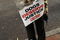 RICHMOND, VA - DECEMBER 10:  Animals rights activist Julia Novak and her dog Frankie wait outside a sentencing hearing for Atlanta Falcons quarterback Michael Vick in federal court December 10, 2007 in Richmond, Virginia. Vick and three associates pleaded guilty to charges related to their roles running an interstate dogfighting ring.  (Photo by Jonathan Ernst/Getty Images)