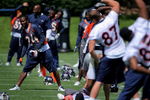 ENGLEWOOD, CO - JUNE 12:  Cornerback Champ Bailey #24 of the Denver Broncos stretches with his teammates as he participates in minicamp practice at the Broncos Dove Valley training facility on June 12, 2009 in Englewood, Colorado.  (Photo by Doug Pensinger/Getty Images)