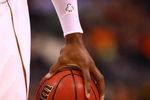 OKLAHOMA CITY - MARCH 11:  Center Dexter Pittman #34 of the Texas Longhorns grips the basketball with one hand before a freethrow shot during the Phillips 66 Big 12 Men's Basketball Championship at the Ford Center March 11, 2009 in Oklahoma City, Oklahoma.  (Photo by Ronald Martinez/Getty Images)
