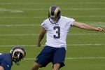 ST. LOUIS - JULY 31:  Josh Brown #3 of the St. Louis Rams practices place kicking during training camp at the Russell Athletic Training Facility on July 31, 2009 in St. Louis, Missouri.  (Photo by Dilip Vishwanat/Getty Images)