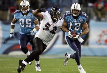 NASHVILLE, TN - JANUARY 10:  Wide receiver Justin Gage #12 of the Tennessee Titans looks to avoid a tackle by Ray Lewis #52 of the Baltimore Ravens in the second quarter during the AFC Divisional Playoff Game on January 10, 2009 at LP Field in Nashville, Tennessee.  (Photo by Andy Lyons/Getty Images)