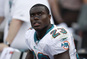 MIAMI - JANUARY 4:  Ronnie Brown #23 of the Miami Dolphins looks on during a AFC Wild Card playoff game against the Baltimore Ravens on January 4, 2009 at Dolphin Stadium in Miami, Florida. (Photo by Gregory Shamus/Getty Images)