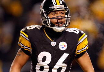 PITTSBURGH - JANUARY 18:  Hines Ward #86 of the Pittsburgh Steelers reacts after he made a 45-yard reception in the first quarter against the Baltimore Ravens during the AFC Championship game on January 18, 2009 at Heinz Field in Pittsburgh, Pennsylvania.  (Photo by Streeter Lecka/Getty Images)