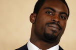 RICHMOND, VA - AUGUST 27:  Atlanta Falcons quarterback Michael Vick speaks to reporters at the Omni Richmond Hotel after agreeing to a guilty plea on charges stemming from his involvement in a dogfighting ring August 27, 2007, in Richmond, Virginia.  (Photo by Jonathan Ernst/Getty Images)