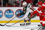 DETROIT - DECEMBER 7:  Marion Gaborik #10 of the Minnesota Wild tries to circle the net with the puck in a game against the Detroit Red Wings on December 7, 2007 at the Joe Louis Arena in Detroit, Michigan. (Photo by Claus Andersen/Getty Images)