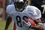 BOURBONNAIS, IL - AUGUST 04: Earl Bennett #80 of the Chicago Bears runs with the ball during a training camp practice on August 4, 2009 at Olivet Nazarene University in Bourbonnais, Illinois. (Photo by Jonathan Daniel/Getty Images)