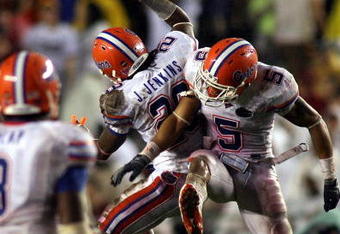 TALLAHASSEE, FL - NOVEMBER 29:  Cornerback Janoris Jenkins #29 of the Florida Gators celebrates his interception with teammate Joe Haden #5 against the Florida State Seminoles during the first half at Bobby Bowden Field at Doak Campbell Stadium on November 29, 2008 in Tallahassee, Florida. The Gators defeated the Seminoles 45-15. (Photo by Marc Serota/Getty Images)