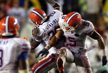 TALLAHASSEE, FL - NOVEMBER 29:  Cornerback Janoris Jenkins #29 of the Florida Gators celebrates his interception with teammate Joe Haden #5 against the Florida State Seminoles during the first half at Bobby Bowden Field at Doak Campbell Stadium on November 29, 2008 in Tallahassee, Florida. The Gators defeated the Seminoles 45-15. (Photo by Marc Serota/Getty Images)