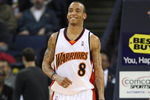 OAKLAND, CA - MARCH 30:  Monta Ellis #8 of the Golden State Warriors looks on against the Memphis Grizzlies during an NBA game on March 30, 2009 at Oracle Arena in Oakland, California. NOTE TO USER: User expressly acknowledges and agrees that, by downloading and or using this photograph, User is consenting to the terms and conditions of the Getty Images License Agreement.  (Photo by Jed Jacobsohn/Getty Images)