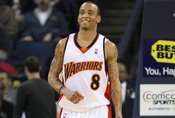 OAKLAND, CA - MARCH 30:  Monta Ellis #8 of the Golden State Warriors looks on against the Memphis Grizzlies during an NBA game on March 30, 2009 at Oracle Arena in Oakland, California. NOTE TO USER: User expressly acknowledges and agrees that, by downloading and or using this photograph, User is consenting to the terms and conditions of the Getty Images License Agreement.  (Photo by Jed Jacobsohn/Getty Images)