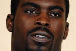 RICHMOND, VA - AUGUST 27:  Atlanta Falcons quarterback Michael Vick speaks to reporters at the Omni Richmond Hotel after agreeing to a guilty plea on charges stemming from his involvement in a dogfighting ring August 27, 2007, in Richmond, Virginia.  (Photo by Jonathan Ernst/Getty Images)