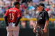 DENVER - MAY 14:  Manager Cecil Cooper #15 of the Houston Astros questions a call with second base umpire Larry Vanover against the Colorado Rockies during MLB action at Coors Field on May 14, 2009 in Denver, Colorado. The Astros defeated the Rockies -3.  (Photo by Doug Pensinger/Getty Images)