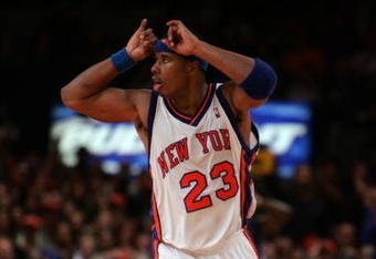 NEW YORK - NOVEMBER 4:  Quentin Richardson #23 of the New York Knicks gestures as he celebrates a play against the Washington Wizards November 4, 2005 at Madison Square Garden in New York, New York. The Wizards defeated the Knicks 86-75.  NOTE TO USER: User expressly acknowledges and agrees that, by downloading and/or using this Photograph, user is consenting to the terms and conditions of the Getty Images License Agreement.  (Photo by Nick Laham/Getty Images) 
