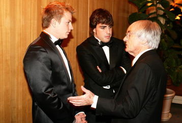 MONTE CARLO, MONACO - DECEMBER 07:  In this handout image provided by FIA, (L-R) Formula One Drivers Kimi R?ikk?nen and Fernando Alonso with FOM President Bernis Ecclestone at the 2007 FIA Gala Prize Giving Ceremony held at the Salle des Etoiles Sporting Club on December 7, 2007 in Monte Carlo, Monaco. (Photo by FIA via Getty Images)