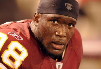 BALTIMORE, MD - AUGUST 13:  Brian Orakpo #98 of the Washington Redskins looks on during a NFL preseason football game against the Baltimore Ravens on August 13, 2009 at M & T Bank Stadium in Baltimore, Maryland.   (Photo by Mitchell Layton/Getty Images)