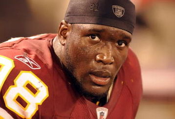 BALTIMORE, MD - AUGUST 13:  Brian Orakpo #98 of the Washington Redskins looks on during a NFL preseason football game against the Baltimore Ravens on August 13, 2009 at M & T Bank Stadium in Baltimore, Maryland.   (Photo by Mitchell Layton/Getty Images)