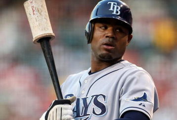 ANAHEIM, CA - AUGUST 11:   Carl Crawford #13 of the Tampa Bay Rays waits on deck in the game with the Los Angeles Angels of Anaheim at Angel Stadium August 11, 2009 in Anaheim, California.   (Photo by Stephen Dunn/Getty Images)