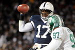 STATE COLLEGE, PA - NOVEMBER 22:  Darryl Clark #17 of the Penn State Nittany Lions scrambles in front of Justin Kershaw #97 of the Michigan State Spartans on November 22, 2008 at Beaver Stadium in State College, Pennsylvania. Penn State won the game 49-18. (Photo by Joe Sargent/Getty Images)