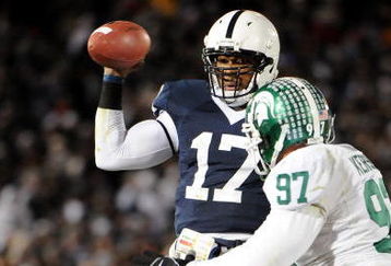 STATE COLLEGE, PA - NOVEMBER 22:  Darryl Clark #17 of the Penn State Nittany Lions scrambles in front of Justin Kershaw #97 of the Michigan State Spartans on November 22, 2008 at Beaver Stadium in State College, Pennsylvania. Penn State won the game 49-18. (Photo by Joe Sargent/Getty Images)