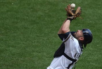 MILWAUKEE - MAY 14: Jason Kendall #18 of the Milwaukee Brewers catches a foul ball against the Florida Marlins on May 14, 2009 at Miller Park in Milwaukee, Wisconsin. The Brewers defeated the Marlins 5-3. (Photo by Jonathan Daniel/Getty Images)