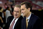 TAMPA, FL - OCTOBER 19: NBC commentators Cris Collinsworth and Al Michaels reports from the sidelines as the Tampa Bay Buccaneers host the Seattle Seahawks at Raymond James Stadium on October 19, 2008 in Tampa, Florida.  (Photo by Al Messerschmidt/Getty Images) 