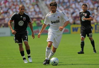 LANDOVER, MD - AUGUST 09:  Esteban Granero #23 of Real Madrid controls the ball against D.C. United during action at Fed Ex Field on August 9, 2009 in Landover, Maryland. Real Madrid defeated D.C. United 3-0 in the friendly match.  (Photo by Doug Pensinger/Getty Images)