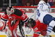 NEWARK, NJ - APRIL 07: Lee Stempniak #12 of the Toronto Maple Leafs is upended by Johnny Oduya #29 of the New Jersey Devils on April 7, 2009 at the Prudential Center in Newark, New Jersey. (Photo by Bruce Bennett/Getty Images)