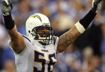 INDIANAPOLIS - JANUARY 13:  Shawne Merriman #56 of the San Diego Chargers celebrates after their 28-24 win against the Indianapolis Colts during their AFC Divisional Playoff game at the RCA Dome on January 13, 2008 in Indianapolis, Indiana.  (Photo by Doug Pensinger/Getty Images)