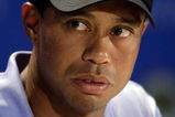 CHASKA, MN - AUGUST 13:  Tiger Woods speaks with the media after a five-under par 67 during the first round of the 91st PGA Championship at Hazeltine National Golf Club on August 13, 2009 in Chaska, Minnesota.  (Photo by Jamie Squire/Getty Images)