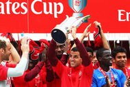 LONDON, ENGLAND - AUGUST 02:  Arsenal  captain Cesc Fabregas lifts the Trophy following his team's victory during the Emirates Cup match between Arsenal and Glasgow Rangers at the Emirates Stadium on August 2, 2009 in London, England.  (Photo by Phil Cole/Getty Images)