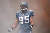 SEATTLE - DECEMBER 07:  Lawrence Jackson #95 of the Seattle Seahawks celebrates as he enters the field before the game against the New England Patriots on December 7, 2008 at Qwest Field in Seattle, Washington. The Patriots defeated the Seahawks 24-21. (Photo by Otto Greule Jr/Getty Images)
