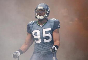 SEATTLE - DECEMBER 07:  Lawrence Jackson #95 of the Seattle Seahawks celebrates as he enters the field before the game against the New England Patriots on December 7, 2008 at Qwest Field in Seattle, Washington. The Patriots defeated the Seahawks 24-21. (Photo by Otto Greule Jr/Getty Images)