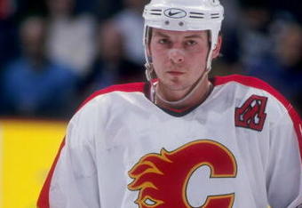 9 Apr 1998:  Right wing Theoren Fleury of the Calgary Flames in action during a game against the Vancouver Canuck at the Canadian Airlines Saddledome in Calgary, Canada. The Canucks defeated the Flames 5-2. Mandatory Credit: Ian Tomlinson  /Allsport