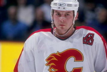 9 Apr 1998:  Right wing Theoren Fleury of the Calgary Flames in action during a game against the Vancouver Canuck at the Canadian Airlines Saddledome in Calgary, Canada. The Canucks defeated the Flames 5-2. Mandatory Credit: Ian Tomlinson  /Allsport