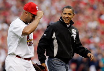ST LOUIS, MO - JULY 14:  U.S. President Barack Obama walks off of the field with Albert Pujols of the St. Louis Cardinals after throwing out the first pitch at the 2009 MLB All-Star Game at Busch Stadium on July 14, 2009 in St Louis, Missouri.  (Photo by Jamie Squire/Getty Images)