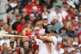 BOSTON - AUGUST 13:  Victor Martinez #41 of the Boston Red Sox swings at the pitch during the game against the Detroit Tigers at Fenway Park on August 13, 2009 in Boston, Massachusetts. (Photo by Elsa/Getty Images)