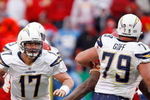 KANSAS CITY, MO - DECEMBER 14:  Philip Rivers #17 of the San Diego Chargers runs against the Kansas City Chiefs during the second half on December 14, 2008 at Arrowhead Stadium in Kansas City, Missouri.  (Photo by Harry How/Getty Images)