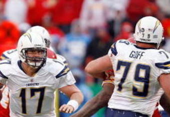 KANSAS CITY, MO - DECEMBER 14:  Philip Rivers #17 of the San Diego Chargers runs against the Kansas City Chiefs during the second half on December 14, 2008 at Arrowhead Stadium in Kansas City, Missouri.  (Photo by Harry How/Getty Images)