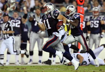 PHILADELPHIA - AUGUST 13:  Julian Edelman #11 of the New England Patriots runs back a punt for a touchdown against the Philadelphia Eagles on August 13, 2009 at Lincoln Financial Field in Philadelphia, Pennsylvania.  (Photo by Jim McIsaac/Getty Images)