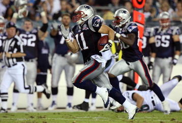 PHILADELPHIA - AUGUST 13:  Julian Edelman #11 of the New England Patriots runs back a punt for a touchdown against the Philadelphia Eagles on August 13, 2009 at Lincoln Financial Field in Philadelphia, Pennsylvania.  (Photo by Jim McIsaac/Getty Images)