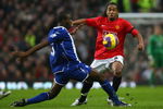 MANCHESTER, UNITED KINGDOM - JANUARY 01:  Anderson of Manchester United is challenged by Fabrice Muamba of Birmingham City during the Barclays Premier League match between Manchester United and Birmingham City at Old Trafford on January 1, 2008 in Manchester, England.  (Photo by Alex Livesey/Getty Images)