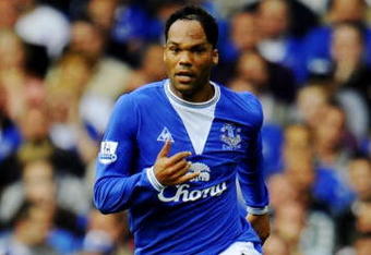 LIVERPOOL, ENGLAND - AUGUST 15:   Joleon Lescott  of Everton runs with the ball during the Barclays Premier League match between Everton and Arsenal at Goodison Park on August 15, 2009 in Liverpool, England. (Photo by Michael Regan/Getty Images)