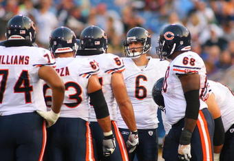 ORCHARD PARK, NY - AUGUST 15:  Jay Cutler #6 of the Chicago Bears huddles with teammates against the Buffalo Bills on  August 15, 2009 at Ralph Wilson Stadium in Orchard Park, New York.  (Photo by Rick Stewart/Getty Images)