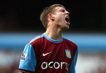 BIRMINGHAM, ENGLAND - AUGUST 15:  James Milner of Aston Villa looks dejected after missing a shot on goal during the Barclays Premier League match between Aston Villa and Wigan Athletic at Villa Park on August 15, 2009 in Birmingham, England.  (Photo by Ryan Pierse/Getty Images)