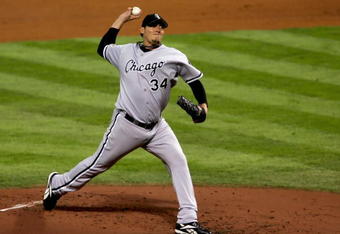HOUSTON - OCTOBER 26:  Starting pitcher Freddy Garcia #34 of the Chicago White Sox throws a pitch against the Houston Astros during the first inning of Game Four of the 2005 Major League Baseball World Series at Minute Maid Park on October 26, 2005 in Houston, Texas.  (Photo by Lisa Blumenfeld/Getty Images)