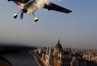 BUDAPEST, HUNGARY - AUGUST 17:  In this handout image supplied by Sports&News, Hungarian pilot Peter Besenyei of Team Red Bull takes part in a fly-over ahead of the Hungarian leg of the Red Bull Air Race World Series on August 17, 2007 in Budapest, Hungary. (Photo by Joerg Mitter/Sports&News via Getty Images)
