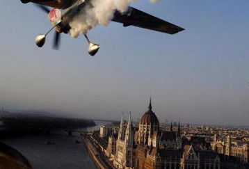 BUDAPEST, HUNGARY - AUGUST 17:  In this handout image supplied by Sports&News, Hungarian pilot Peter Besenyei of Team Red Bull takes part in a fly-over ahead of the Hungarian leg of the Red Bull Air Race World Series on August 17, 2007 in Budapest, Hungary. (Photo by Joerg Mitter/Sports&News via Getty Images)