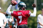 PHILADELPHIA - AUGUST 15:  Michael Vick prepares to throw a pass in a workout at the NovaCare Complex on August 15, 2009 in Philadelphia, Pennsylvania.  (Photo by Len Redkoles/Getty Images)